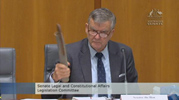 Senator Bill Heffernan with fake pipe bomb at Senate Estimates hearing